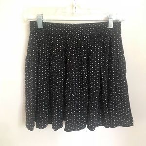 Mini black skirt with pink hearts